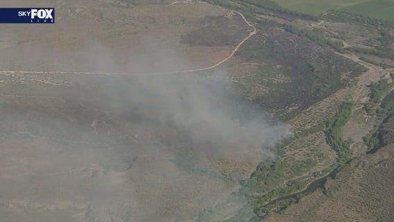 Wildfire closes road near Bartlett Lake