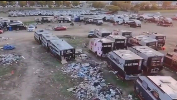 Fires, trash and tears as RV lot cleared out