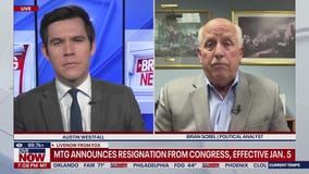 Why is Marjorie Taylor Greene resigning?