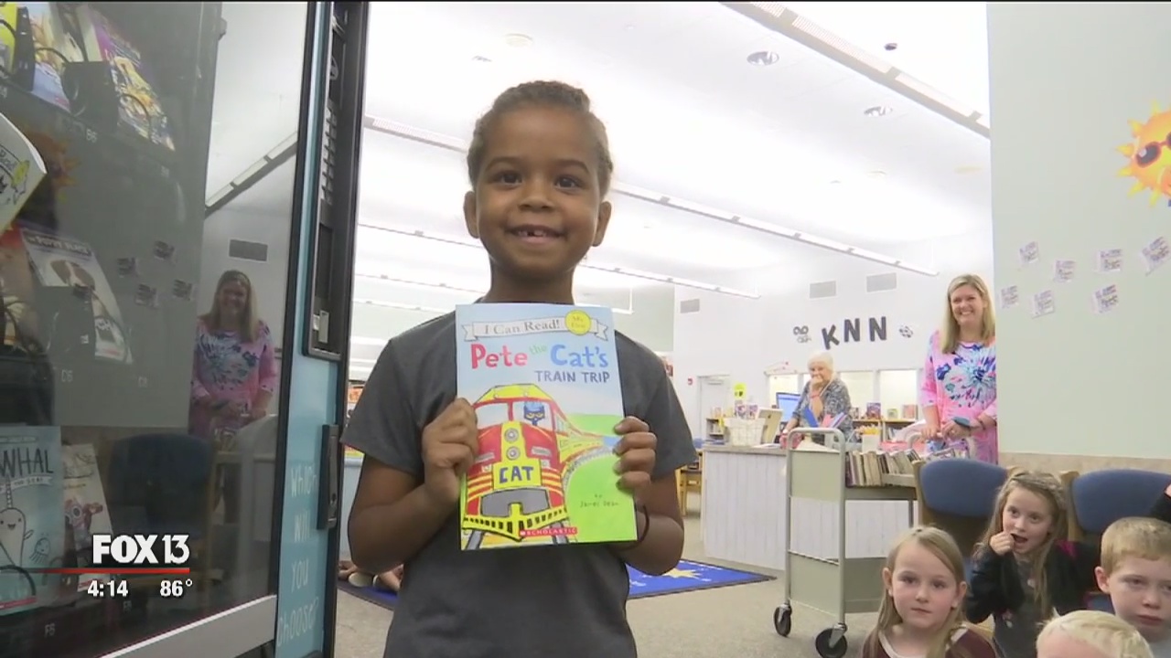 Kids treated to books from vending machine