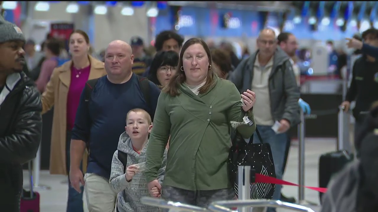 Michigan fans talk from Metro Airport