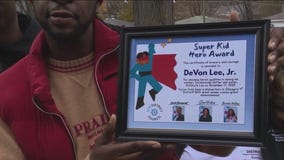 Boy honored after he and mom were attacked