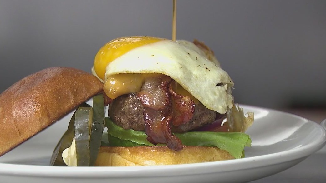 Mac McGee serves up burgers at The Battery