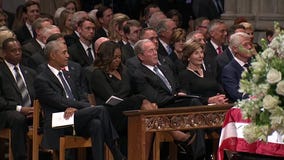 Bush slips Michelle Obama candy
