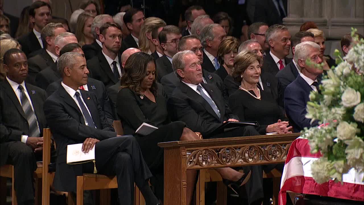 Bush slips Michelle Obama candy