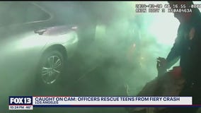 Caught on cam: Officers rescue teens from fiery crash