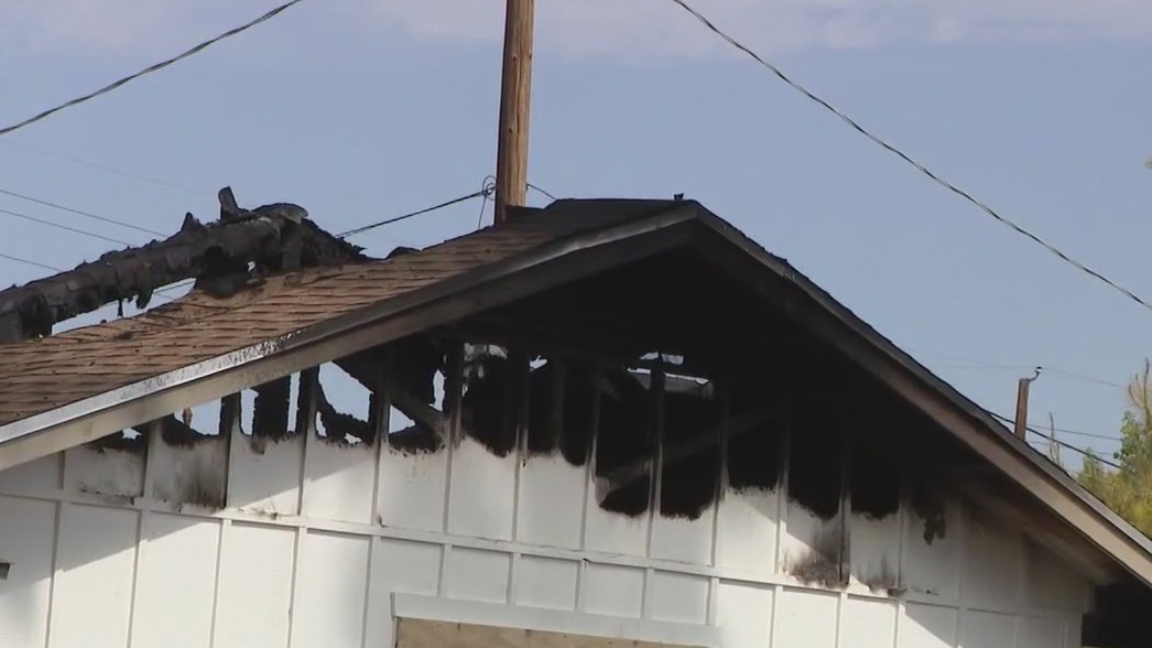 Man sees his neighbor's home go up in flames
