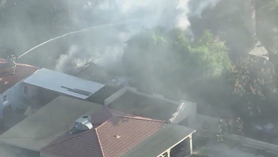 Woman's body found in burning Glendale home