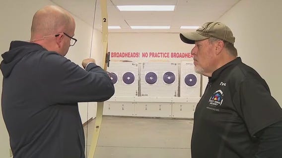 Brian Kramp tries archery