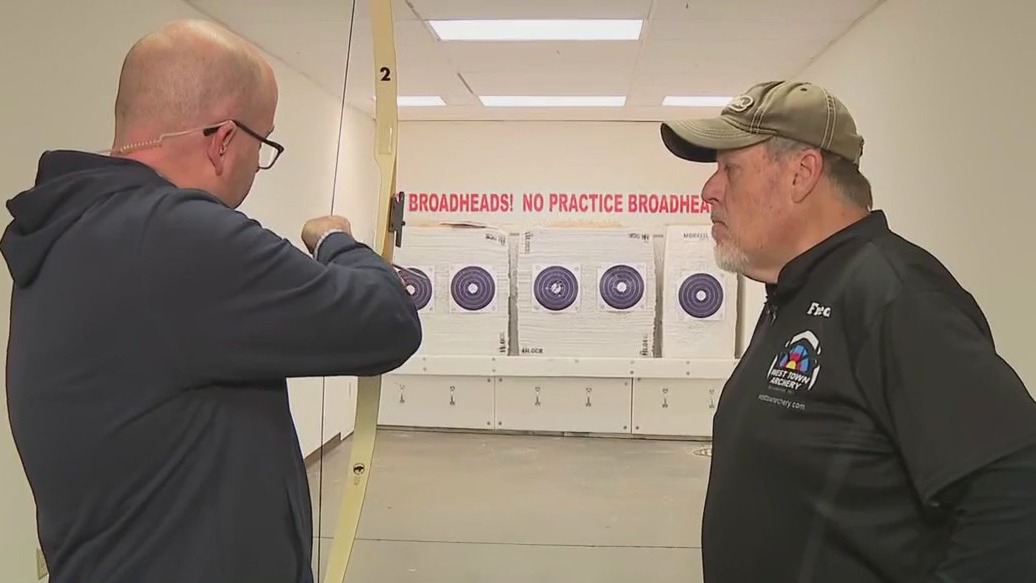 Brian Kramp tries archery