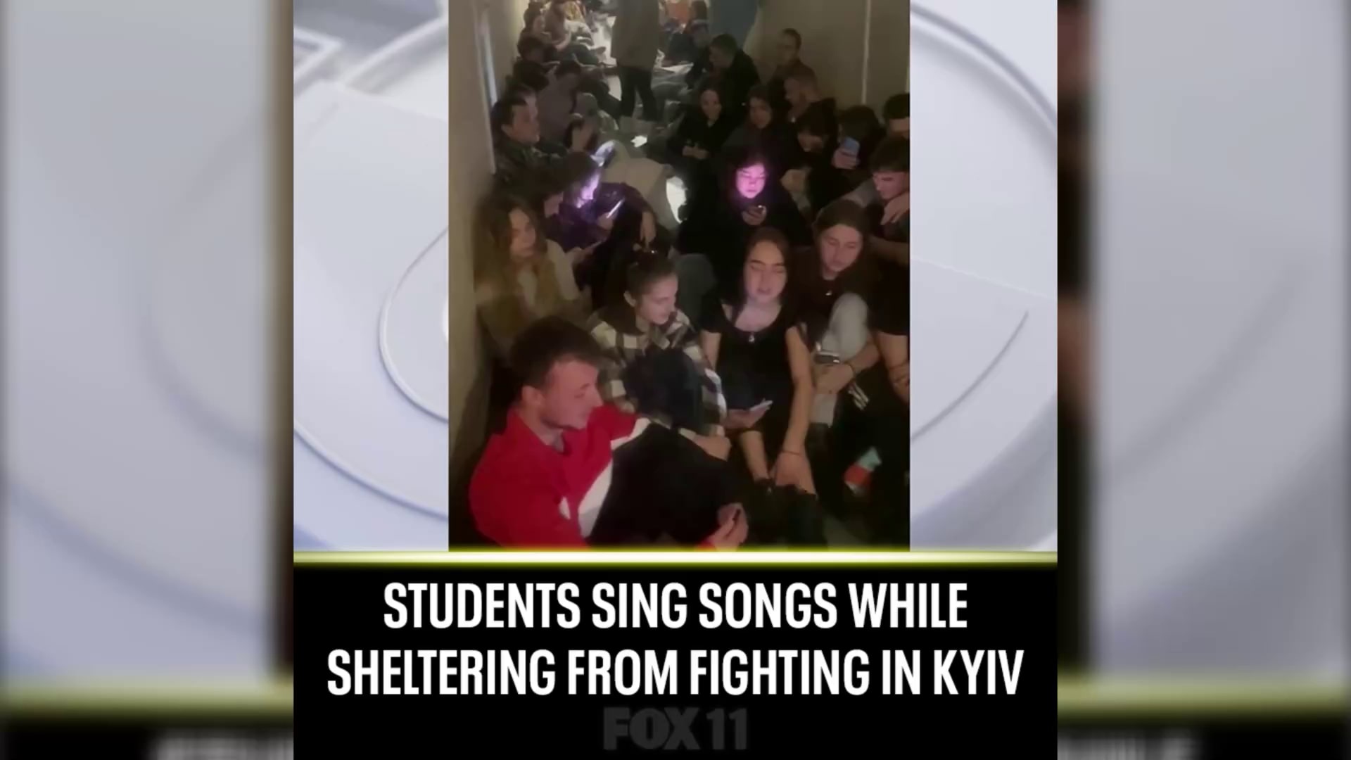 Students sing songs while sheltering from fighting in Kyiv