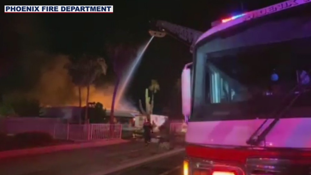 Over 50 firefighters battle house fire in north Phoenix; 2 people ...
