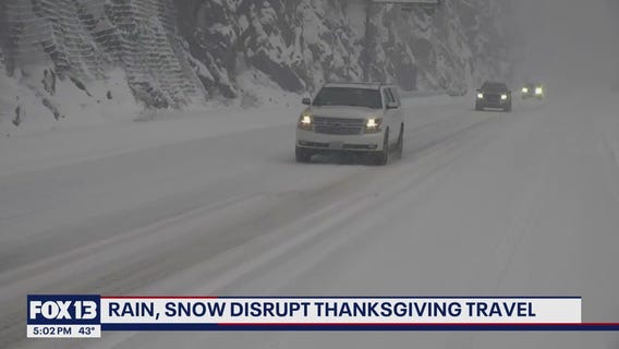 Rain and snow disrupt Thanksgiving travel