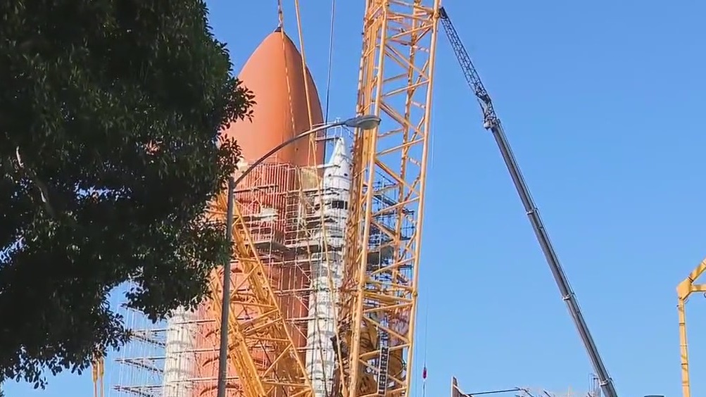 Space shuttle moving into launch position