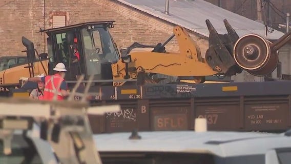 Metra BNSF trains stopped due to freight train derailment