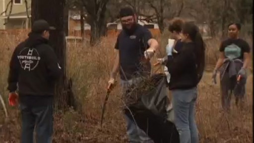 American Youthworks volunteers help clean historic East Austin cemetery