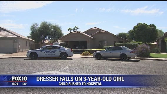 Surprise girl, 3, trapped under falling dresser