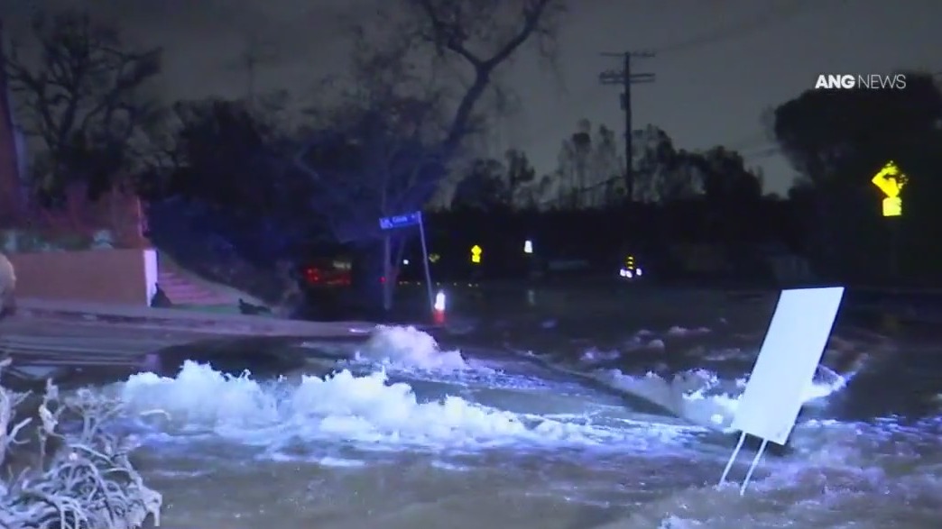 Sinkhole opens after water main break | FOX 11 Los Angeles