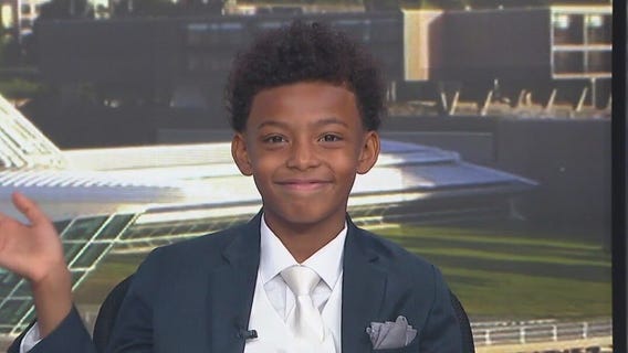 Tay?Vion helps Rob Haswell with the weather