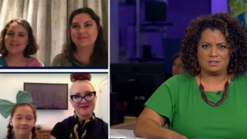 Two Girl Scouts sell cookies in all 50 states