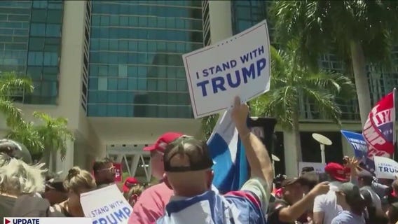 Trial date set for Trump classified documents case