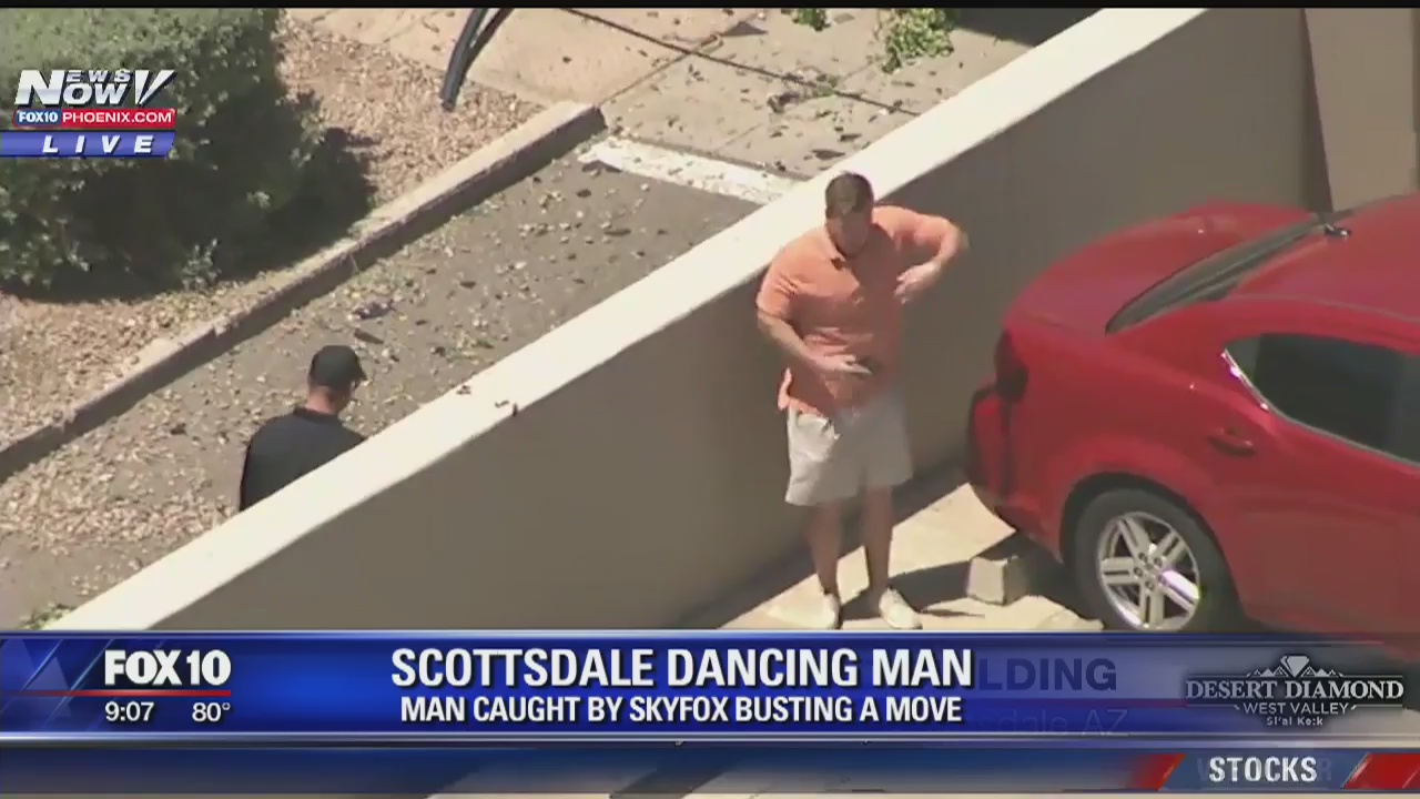 BUST A MOVE: Man dancing near Scottsdale car crash scene going viral