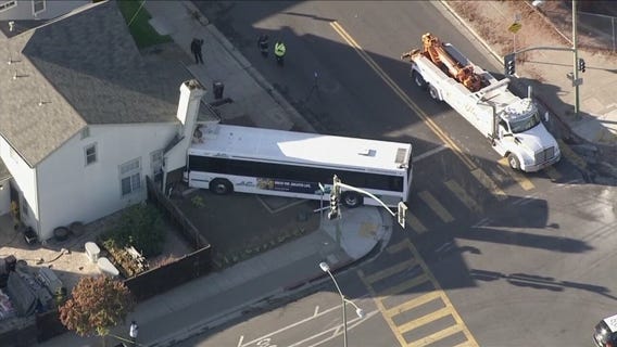 Car involved in CHP pursuit crashes into AC Transit bus, bus crashes into building