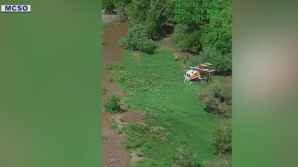 7 people stuck on canoes rescued during flash flooding