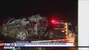 Man dead after SUV crashes into Lynnwood apartment