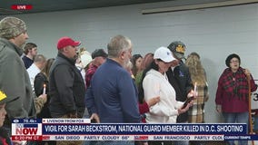 Community holds vigil for slain National Guard member