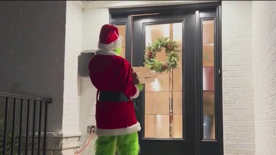 Who exactly is surprising customers while on delivery for a suburban restaurant?