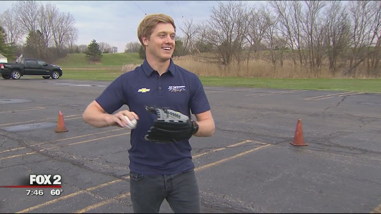 Grand Prix driver throwing out first pitch at Comerica