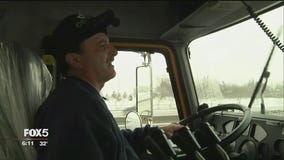 Riding with a highway snow plow