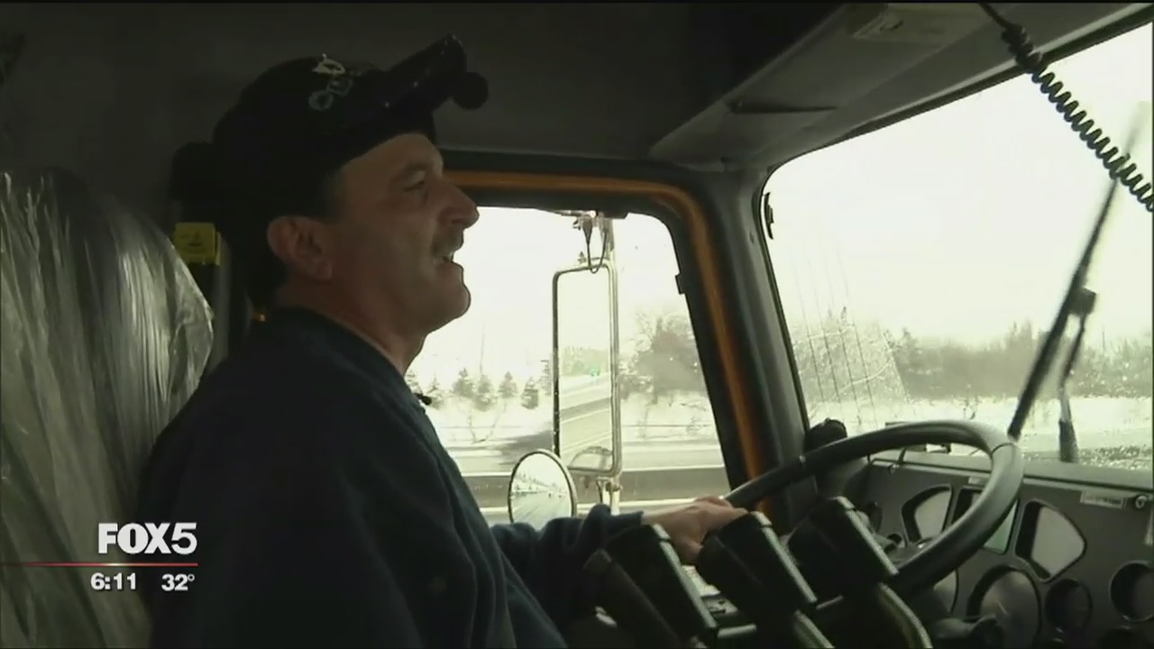 Riding with a highway snow plow