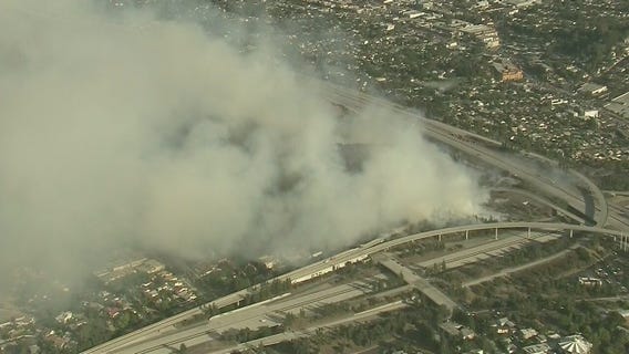 Fire crews battle large brush fire near Eagle Rock