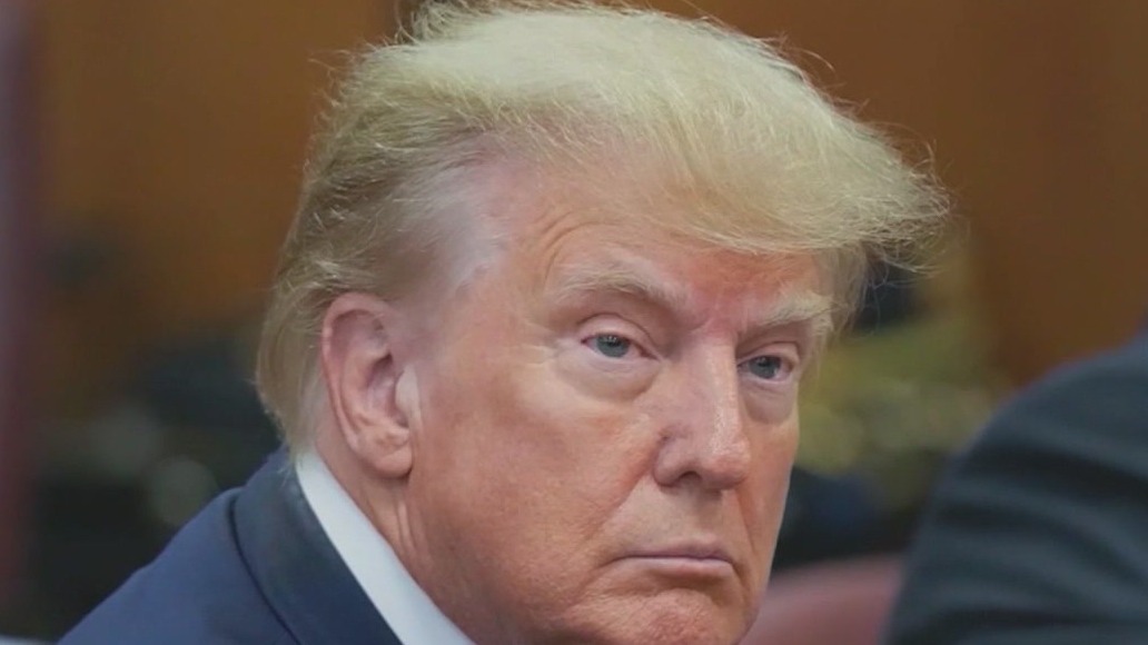 Some charges dropped against Trump, associates