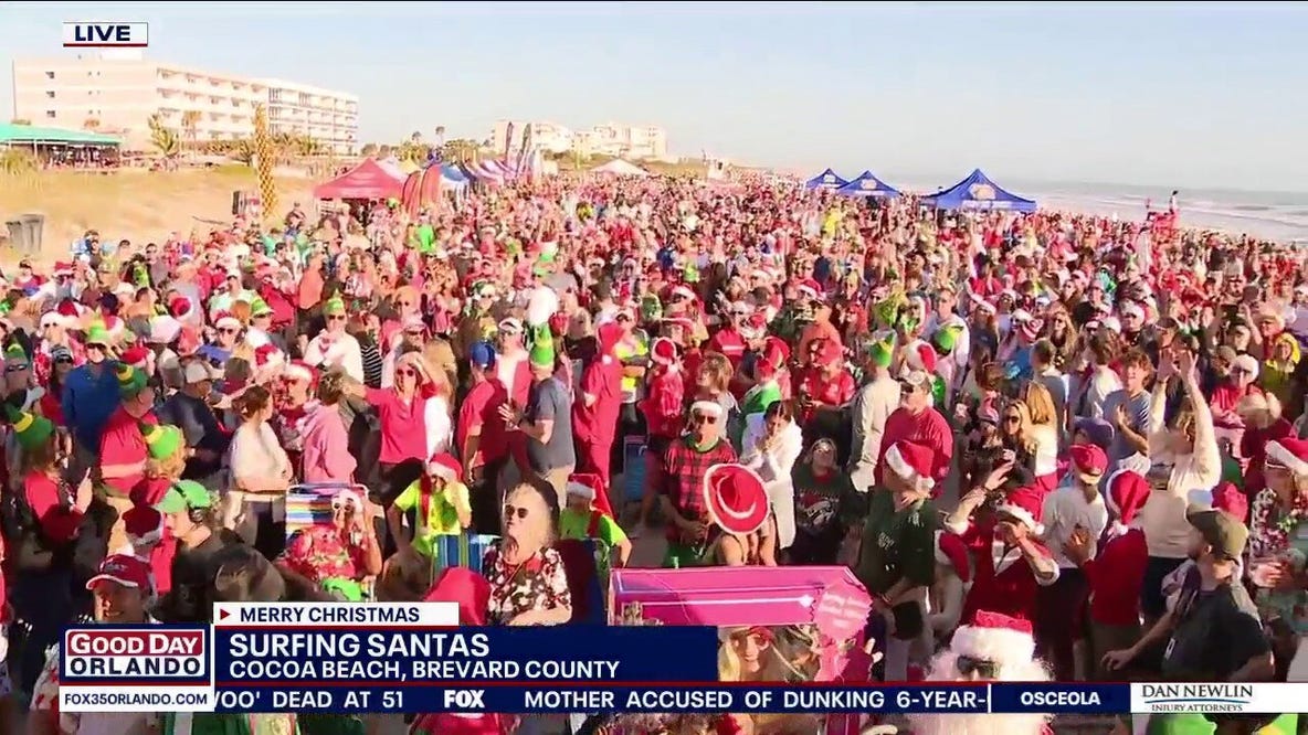 Huge turnout for Surfing Santas in Cocoa Beach
