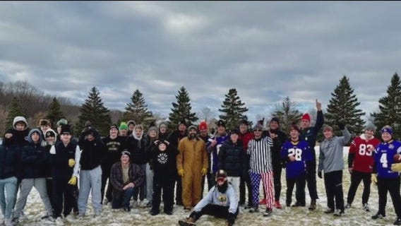 Boys take on dads in Maple Grove football game
