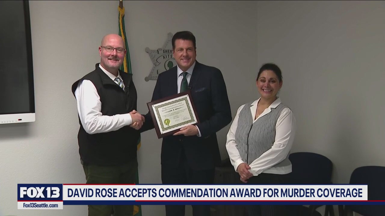 David Rose accepts commendation award for murder coverage