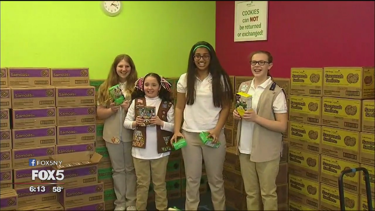 Girl Scouts selling cookies