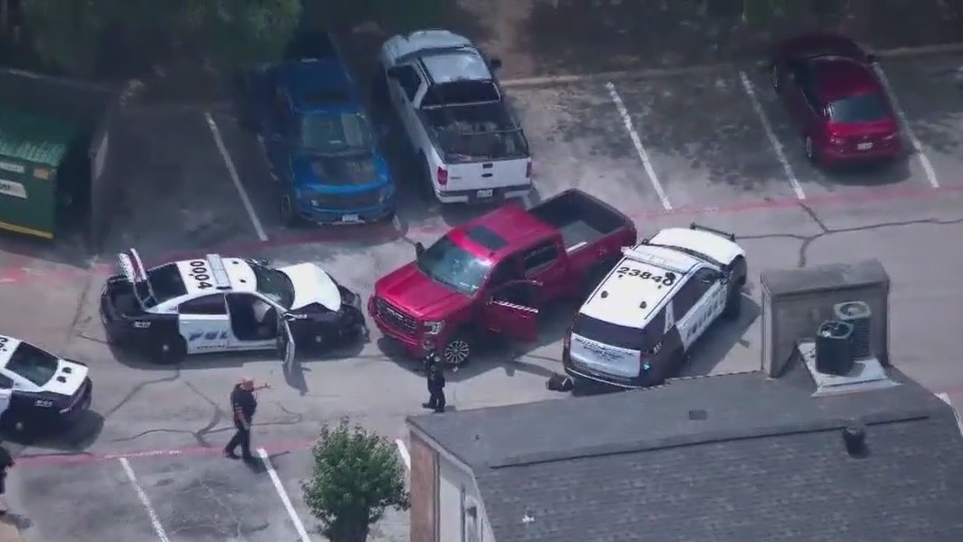 Police shoot suspect after truck rams cruiser