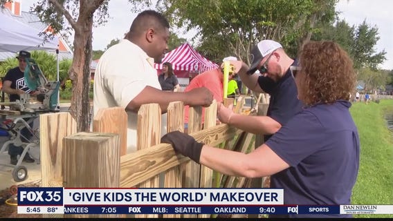 Volunteers donate time and skill to new fence at Give Kids the World