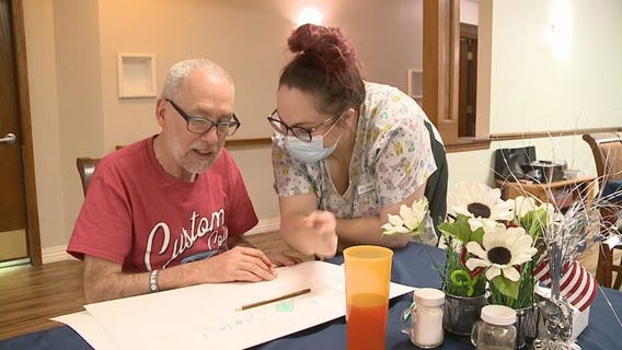 Whitewater senior living collects postcard from all 50 states