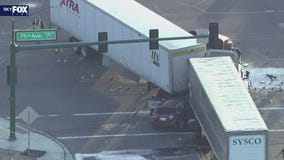 Bad crash involving SUV, semi-trucks in west Phoenix