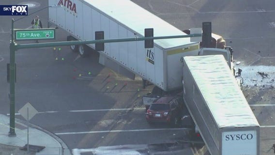 Bad crash involving SUV, semi-trucks in west Phoenix