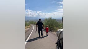 UAPD officer helps 4-year-old boy afraid of heights down hill