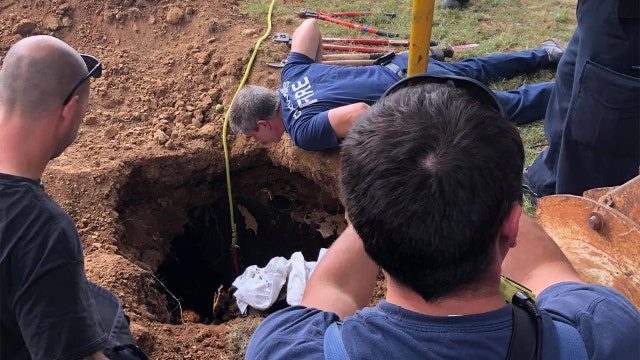 Woman rescued after falling into septic tank, lying in raw sewage for days, officials say