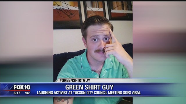 #GreenShirtGuy: Activist who laughed at Trump supporters during city council meeting goes viral
