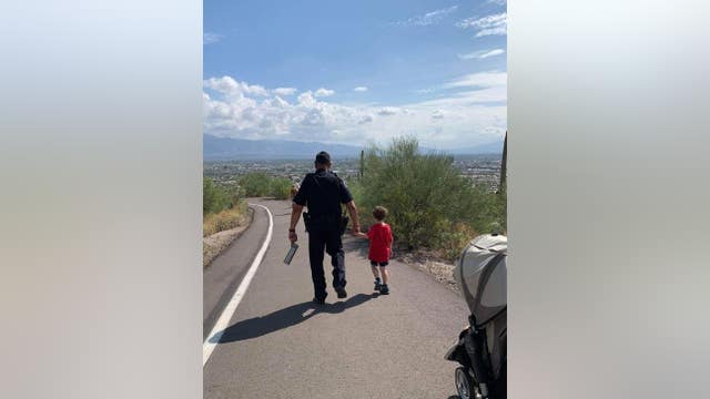 UAPD officer helps 4-year-old boy afraid of heights down hill