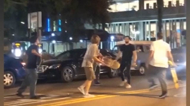 Suspects use skateboards to attack man
